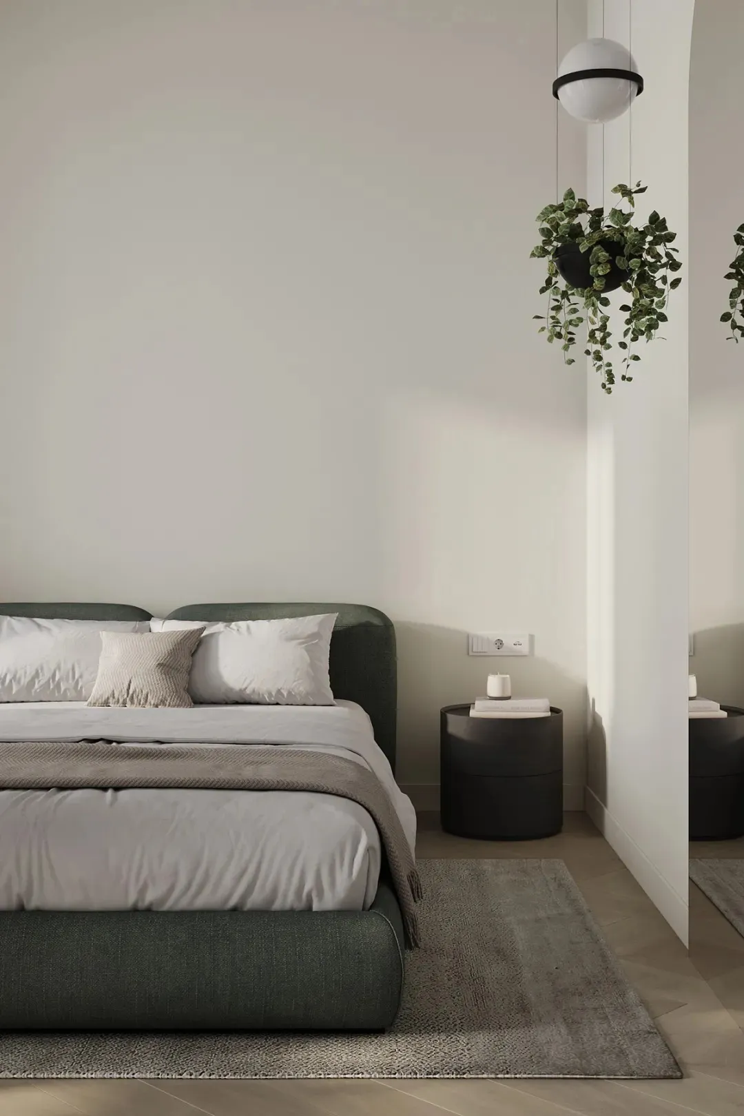 A minimalist bedroom with neutral colors and a black hanging plant.