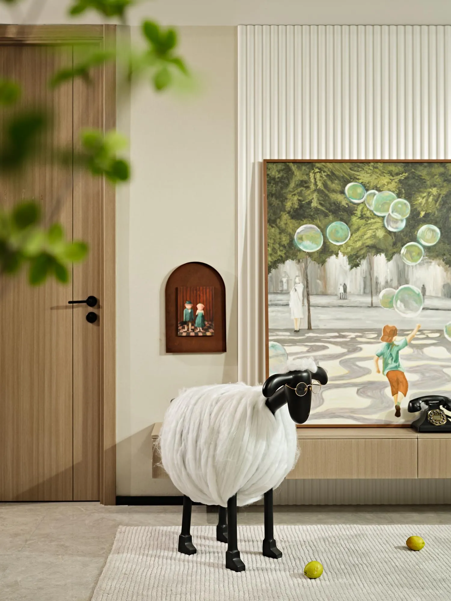 Modern living room featuring a wooden floor and black and white sheep with glasses action