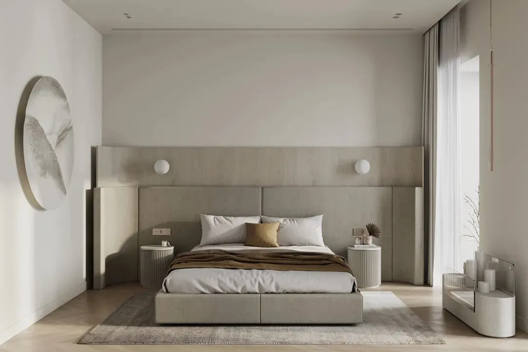 A modern, minimalist bedroom with neutral-toned furniture, a large window, and a large abstract painting.