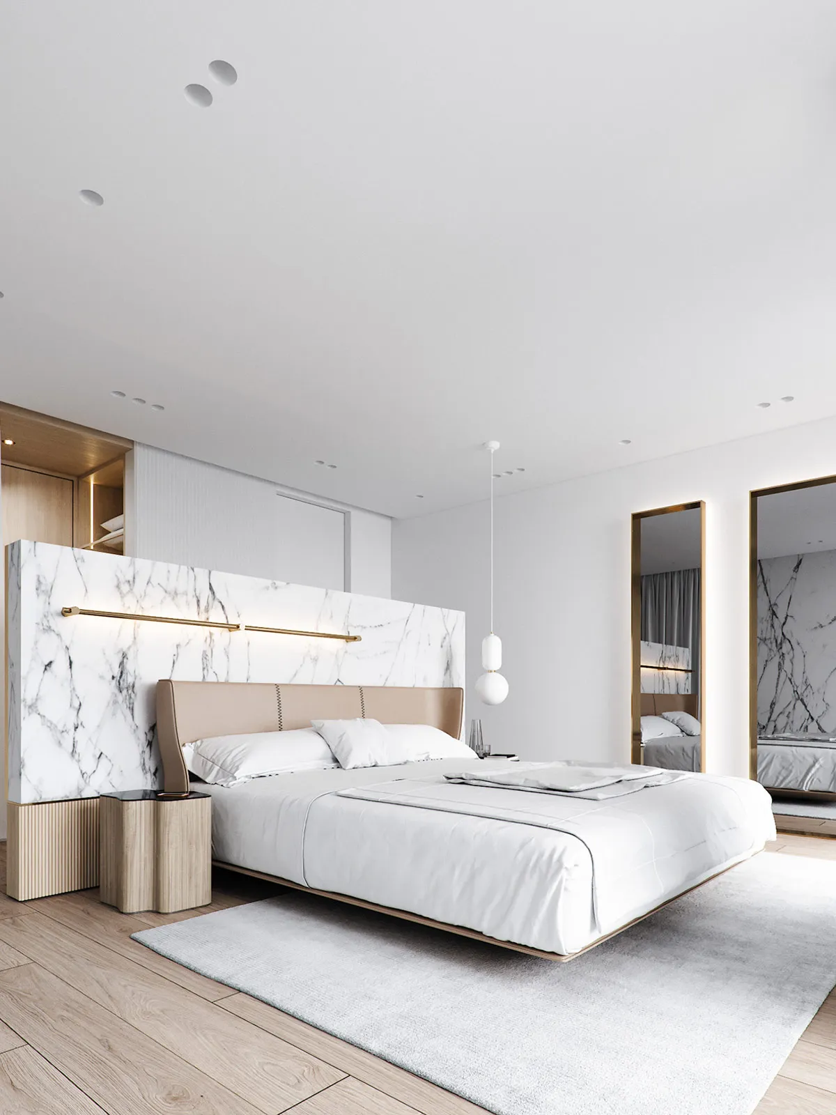 Modern bedroom featuring a marble accent wall and bed platform.