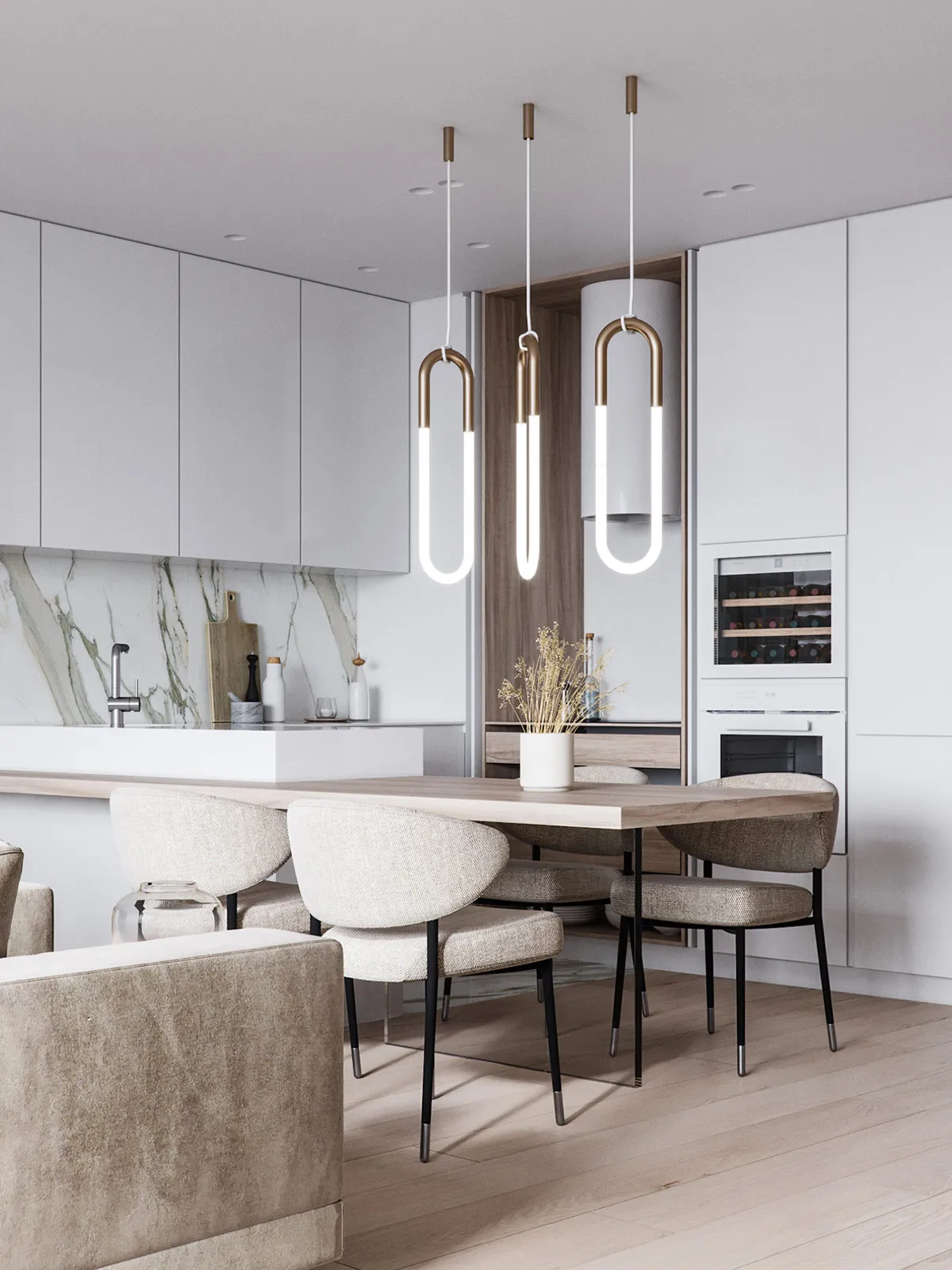A modern minimalist kitchen with a marble backsplash, wooden table, and metal pendant lights.