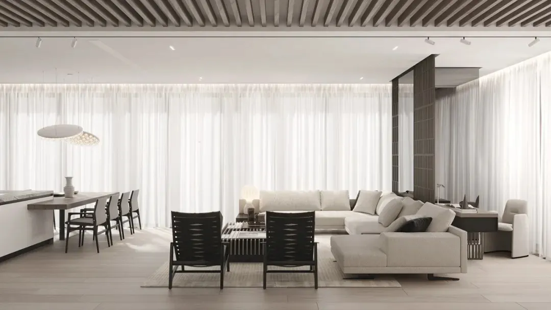 Modern living room with minimalist design featuring a white sofa, black chairs, and a light wooden floor, with large windows