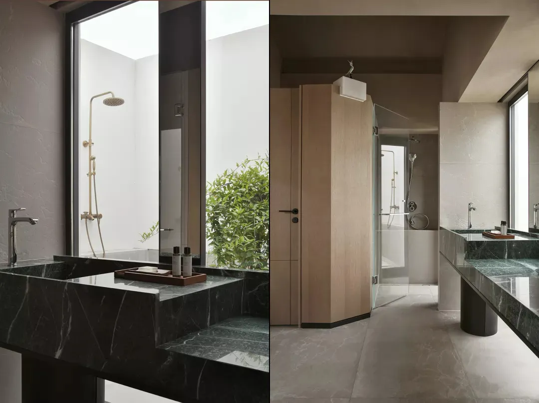A modern bathroom featuring marble accents and concrete flooring.