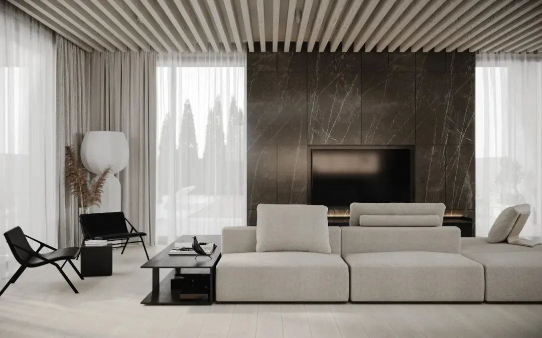 A modern living room with concrete and marble materials.