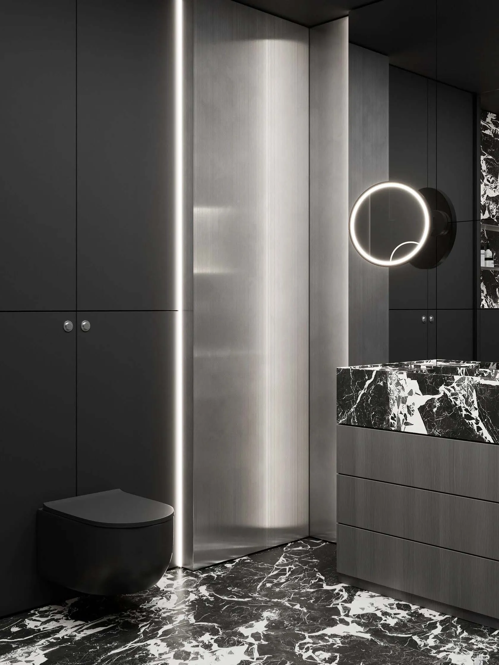 A modern bathroom with marble countertops and flooring, featuring dark cabinetry and a sleek, minimalist design.
