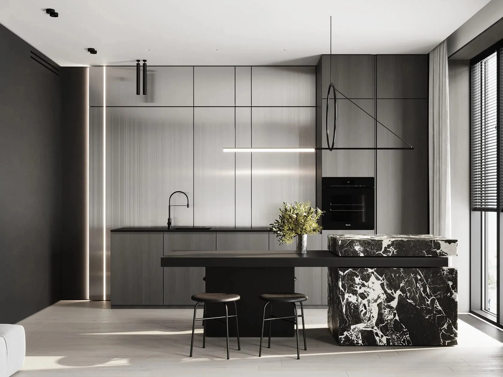 Modern minimalist kitchen featuring a kitchen island with black marble countertops and black stools.