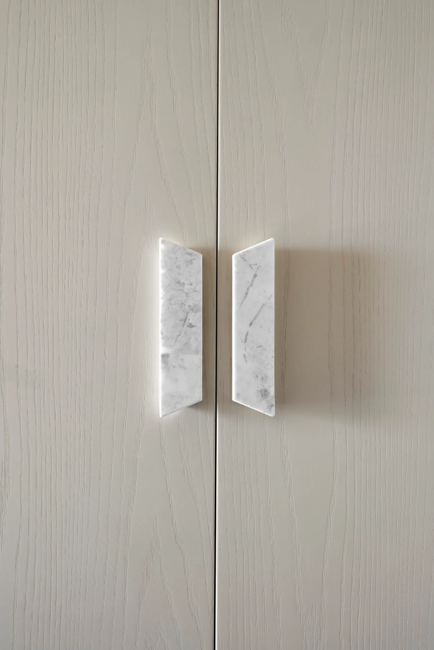 Modern cabinet featuring a marble handle detail.