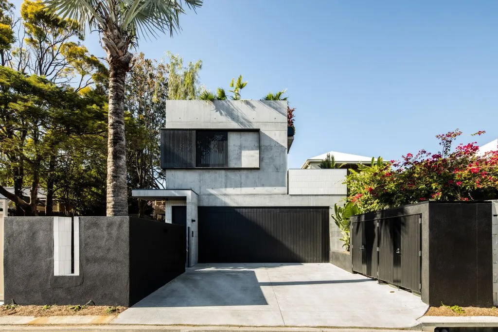 Modern minimalist house with concrete and glass exterior