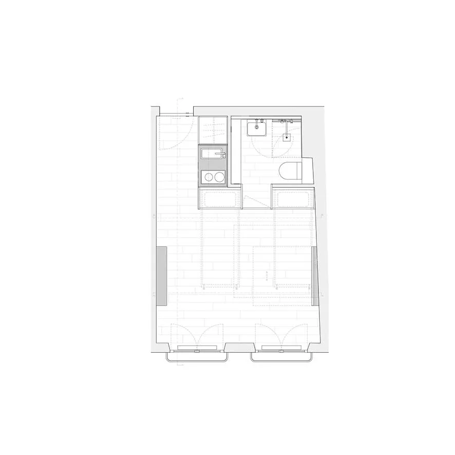 Minimalist kitchen layout in an apartment design