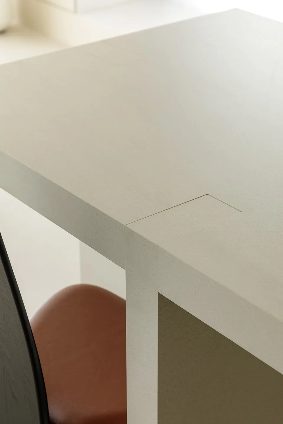 A minimalist concrete table with a seamless surface and clean lines.