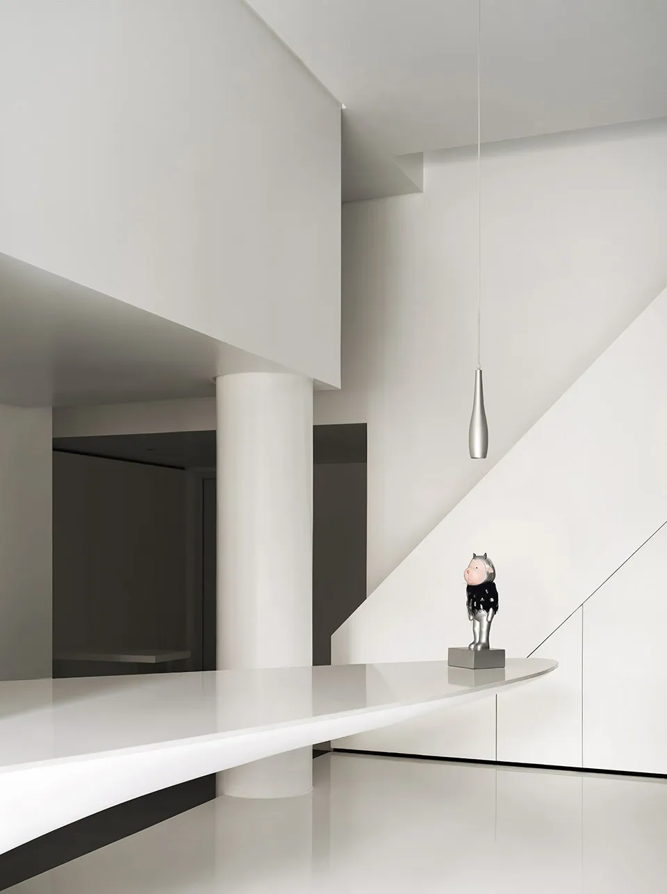 A modern white interior design featuring minimalist aesthetics and clean lines.