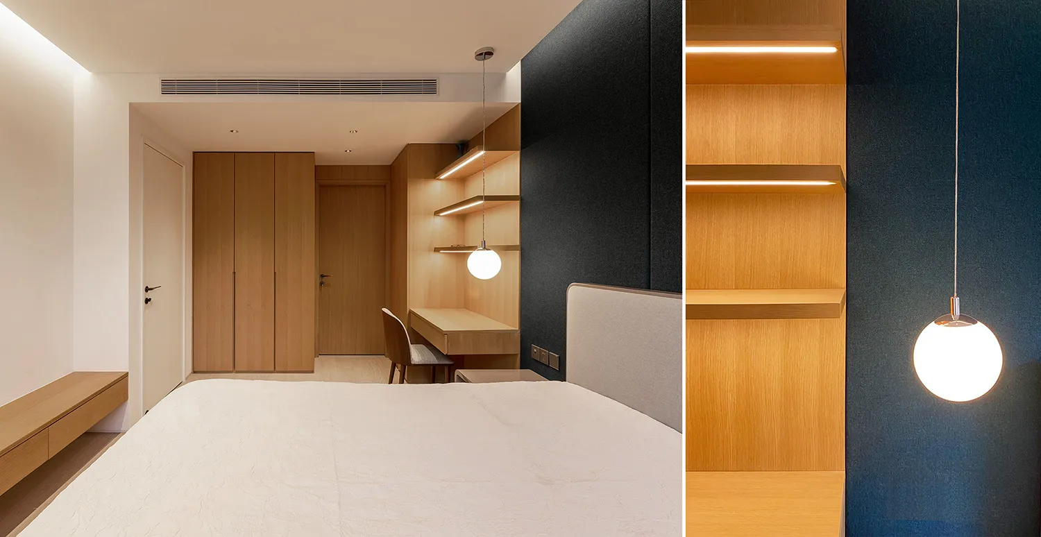A modern minimalist bedroom featuring LED lighting, wood and fabric finishes, and a comfortable sleeping area with a white be