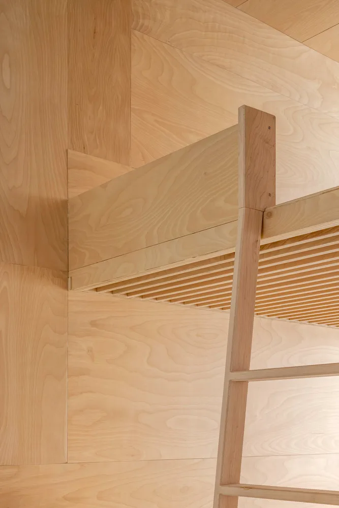 A modern architecture interior with a wall made of wood panels