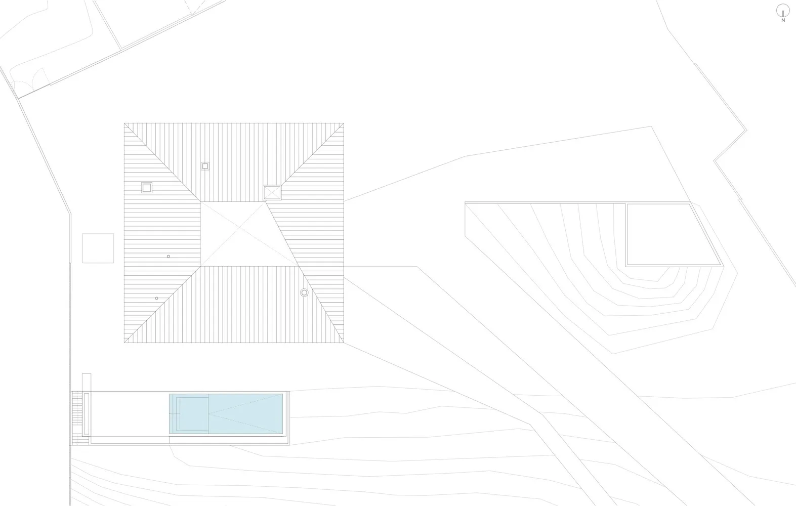 Floor plan of a residential building featuring concrete and glass materials.