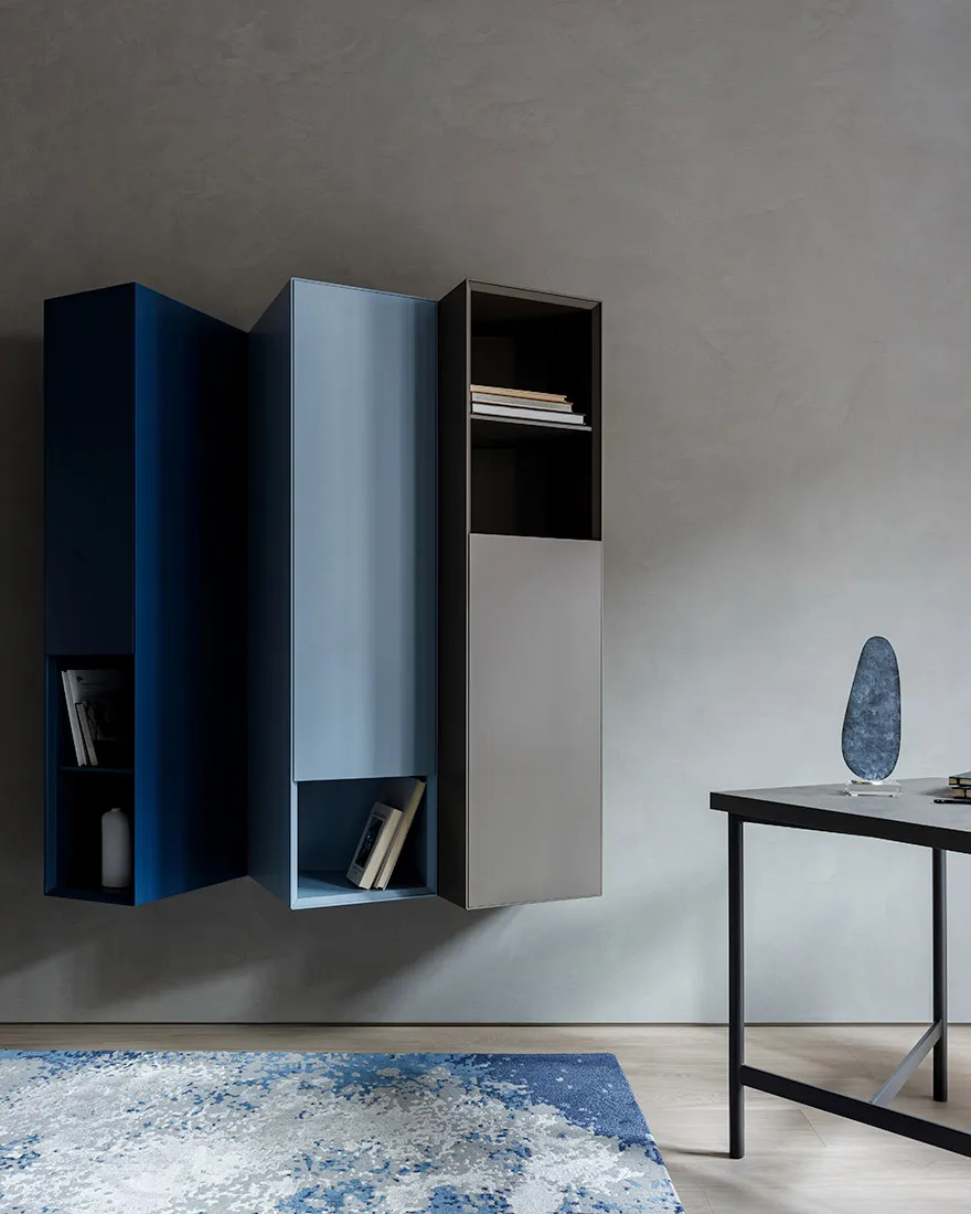 Minimalist metal furniture consisting of an open bookshelf and a closed cabinet.