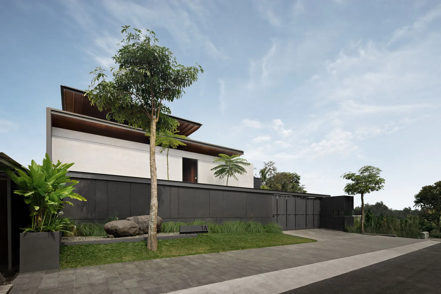 Modern residential home with a metallic façade, featuring sleek lines and a contemporary design.