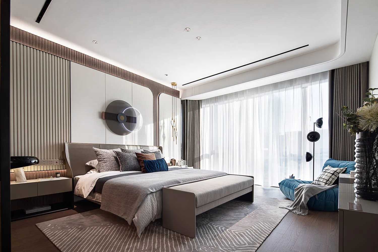A modern bedroom featuring fabric elements and contemporary design.