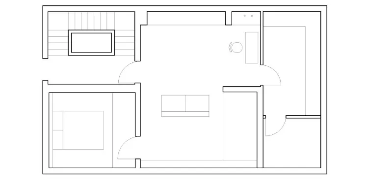 A minimalist floor plan layout showing a living area, bedroom, and staircase.