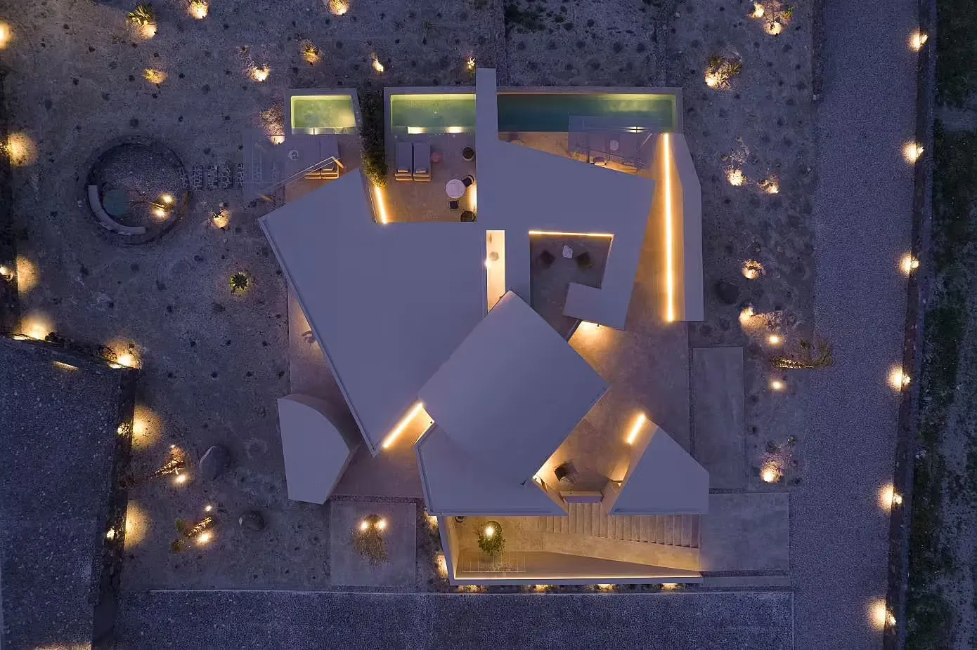 A minimalist residential building with concrete walls and a modern design.