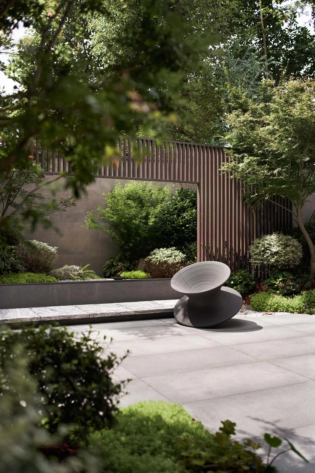 Concrete planters and seating in a modern landscape design garden
