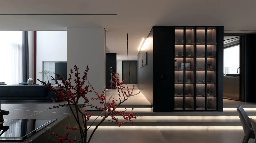Modern living room with concrete flooring and minimalist design.