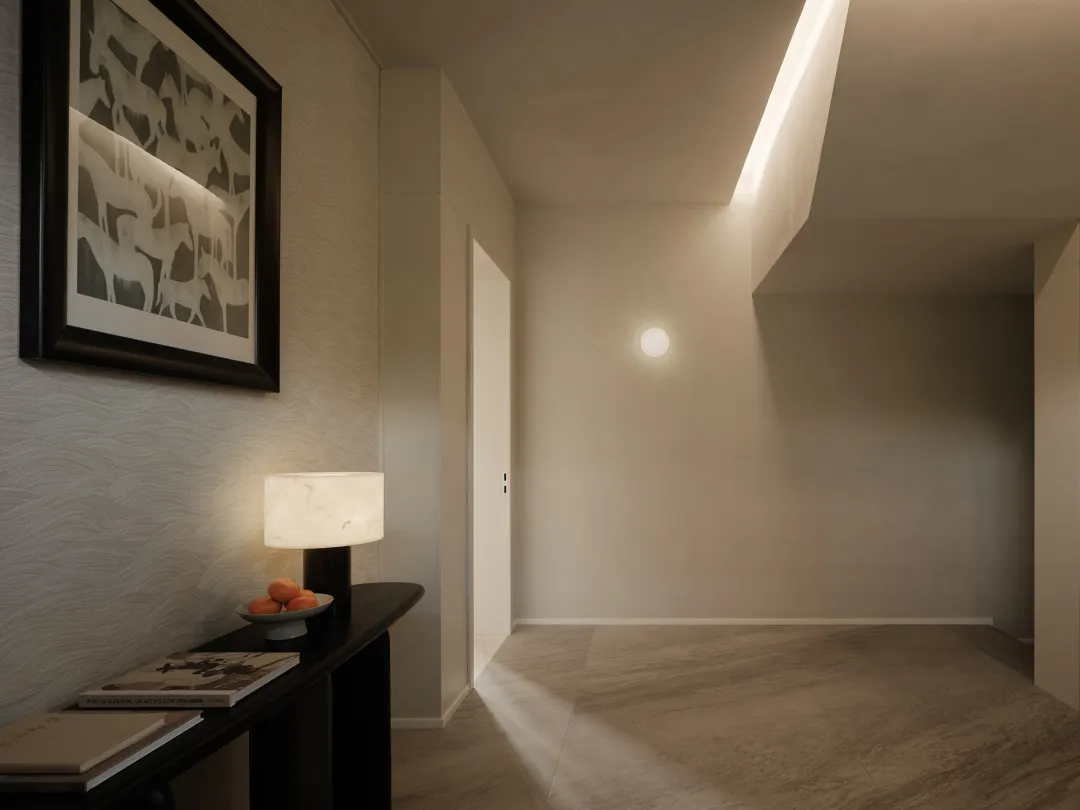 A minimalist entryway featuring modern lighting fixtures and a warm color palette.