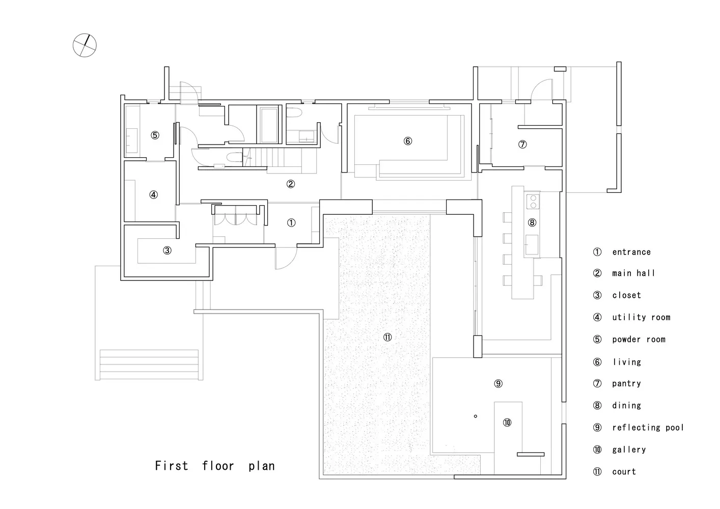 Floor plan of a residential building with labeled rooms and spaces.