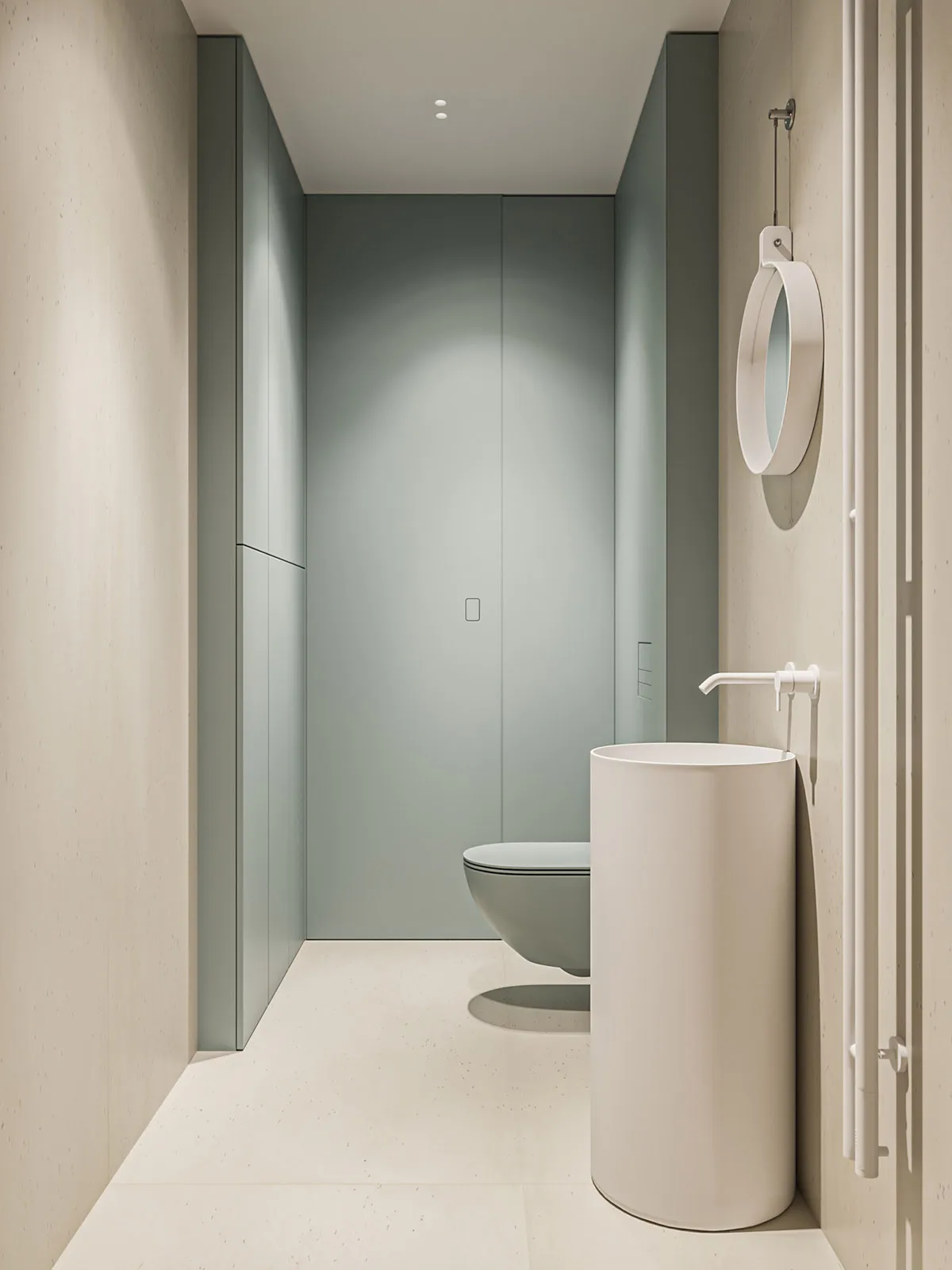 A modern, compact bathroom with a ceramic floor and minimalist design.