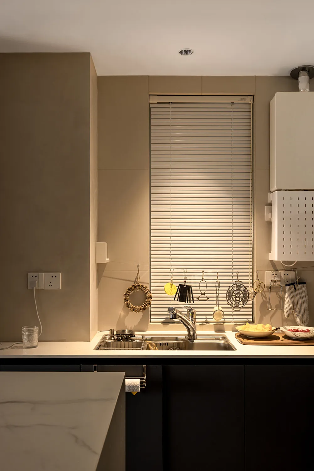 Modern kitchen with metal countertops and stainless steel sink