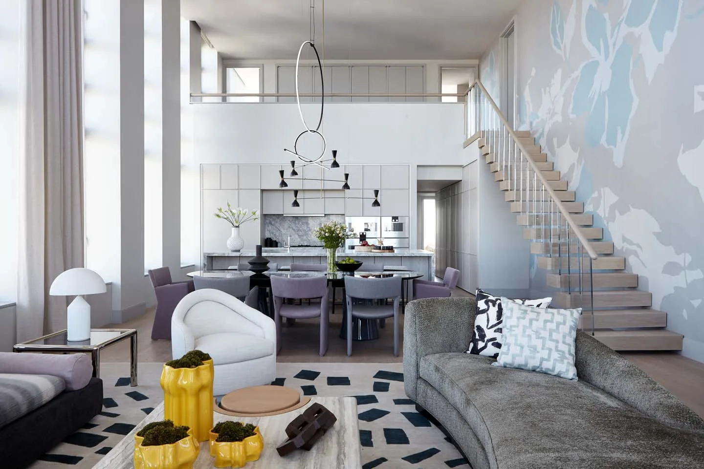 Modern living room with contemporary furniture and decor.