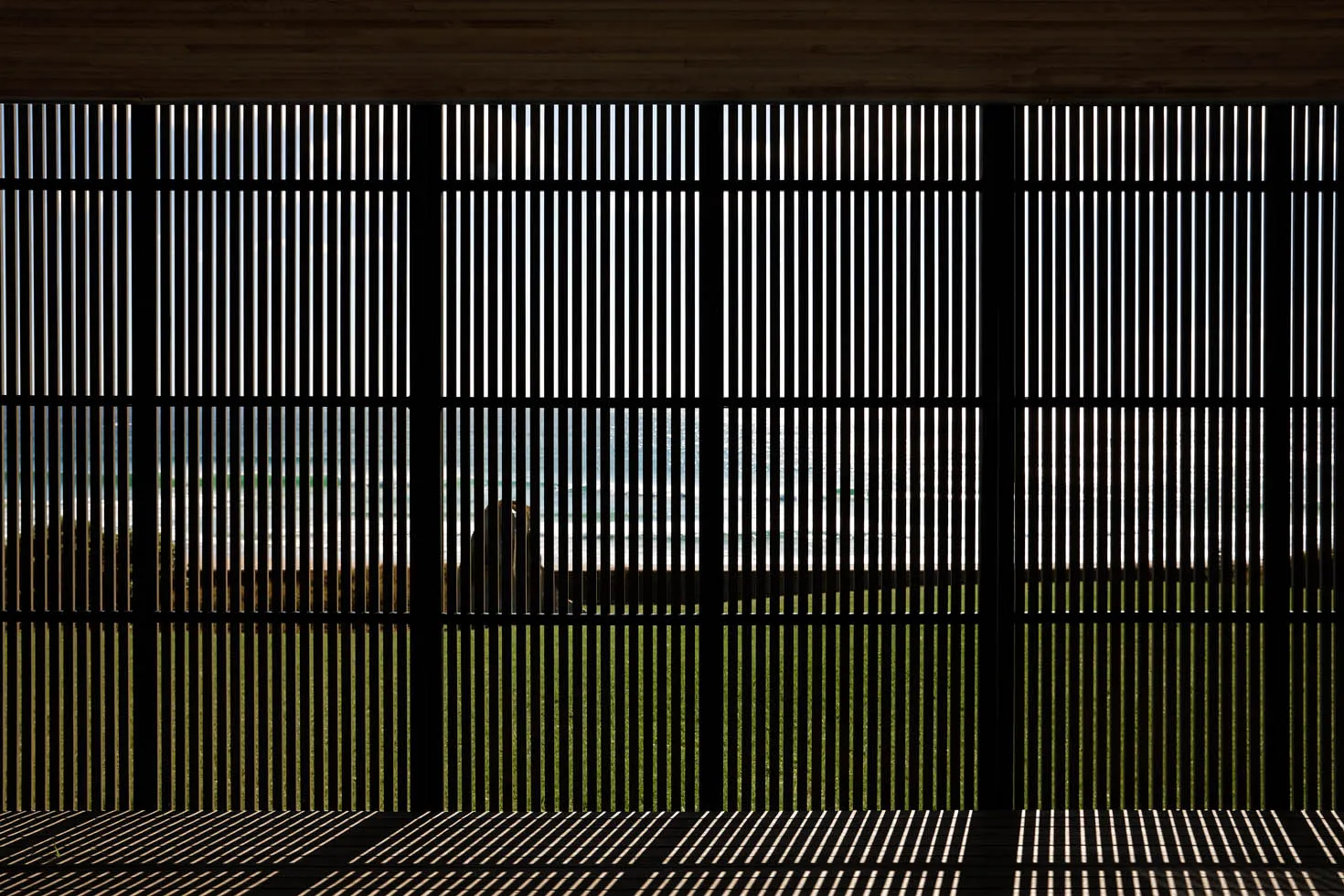 A modern interior space featuring metallic mesh, providing a contemporary and sleek aesthetic.