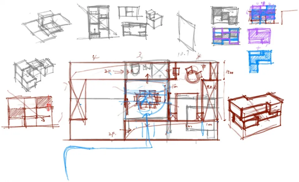 一張手繪建築草圖,展示彩色紙張上的各種房間設計。