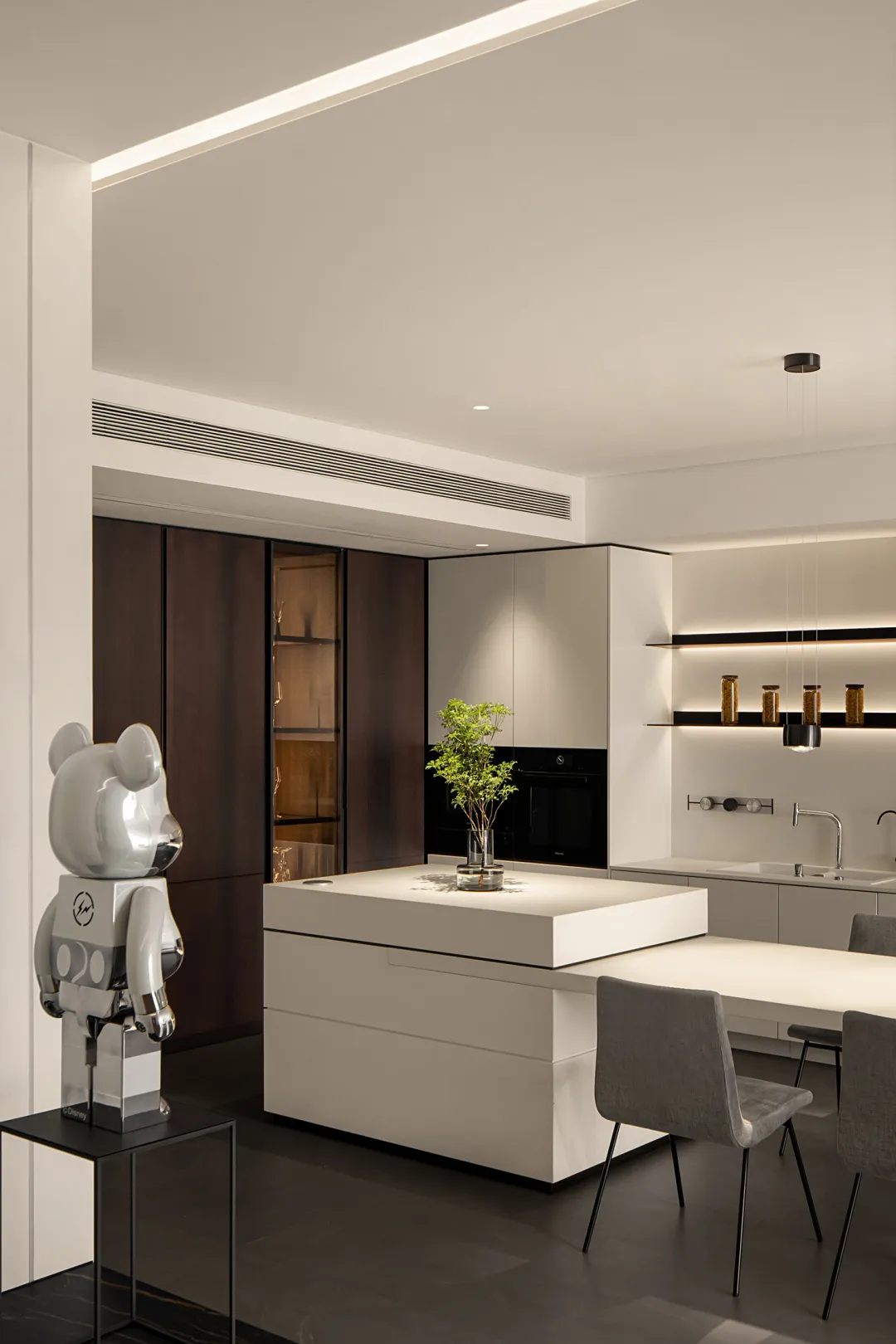 A modern minimalist kitchen with sleek, contemporary features.