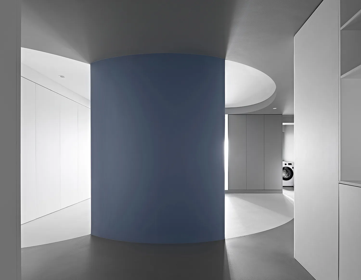 Modern, minimalist interior featuring a concrete column.