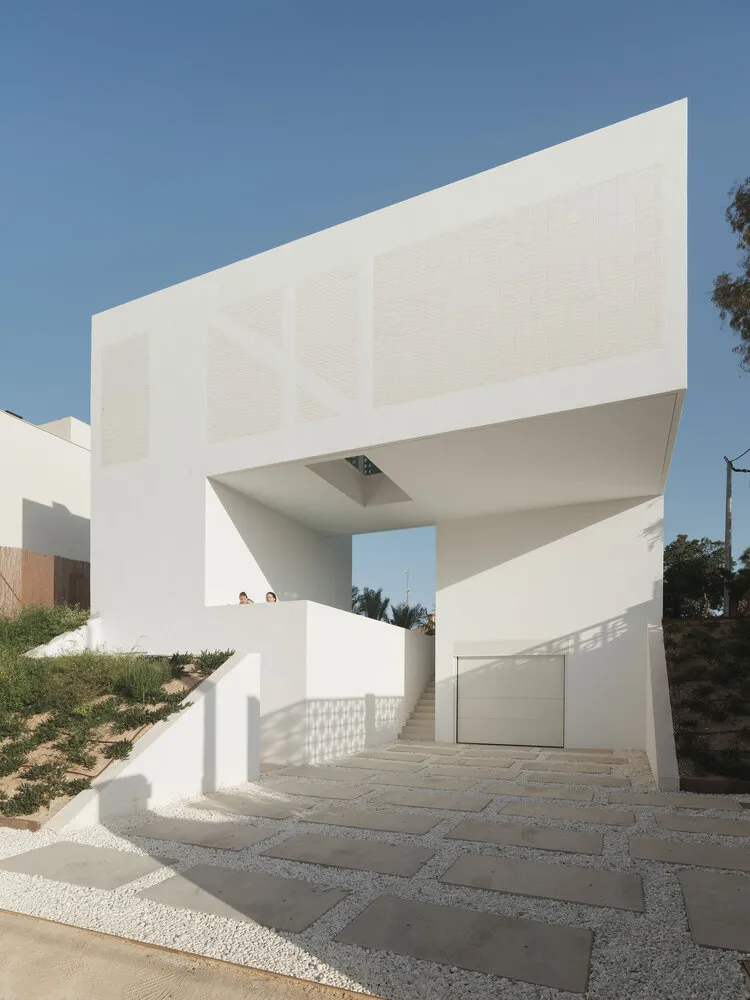 A modern architectural design featuring concrete