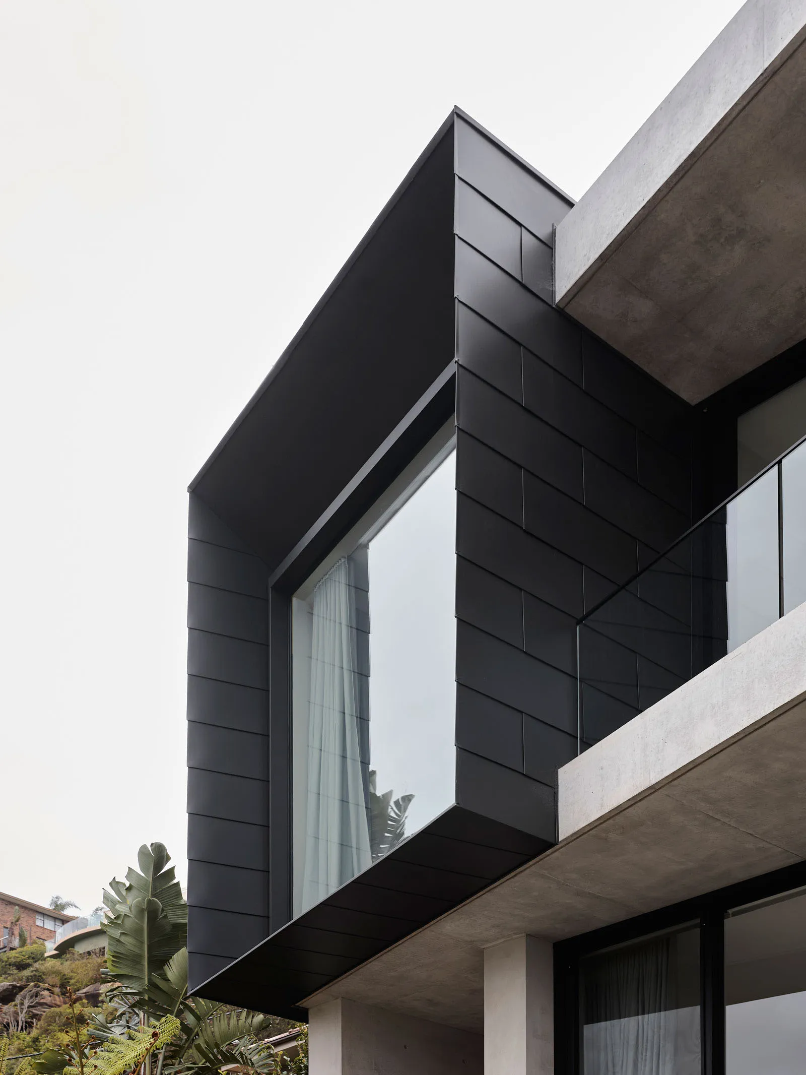Black metal cladding on a minimalist modern balcony