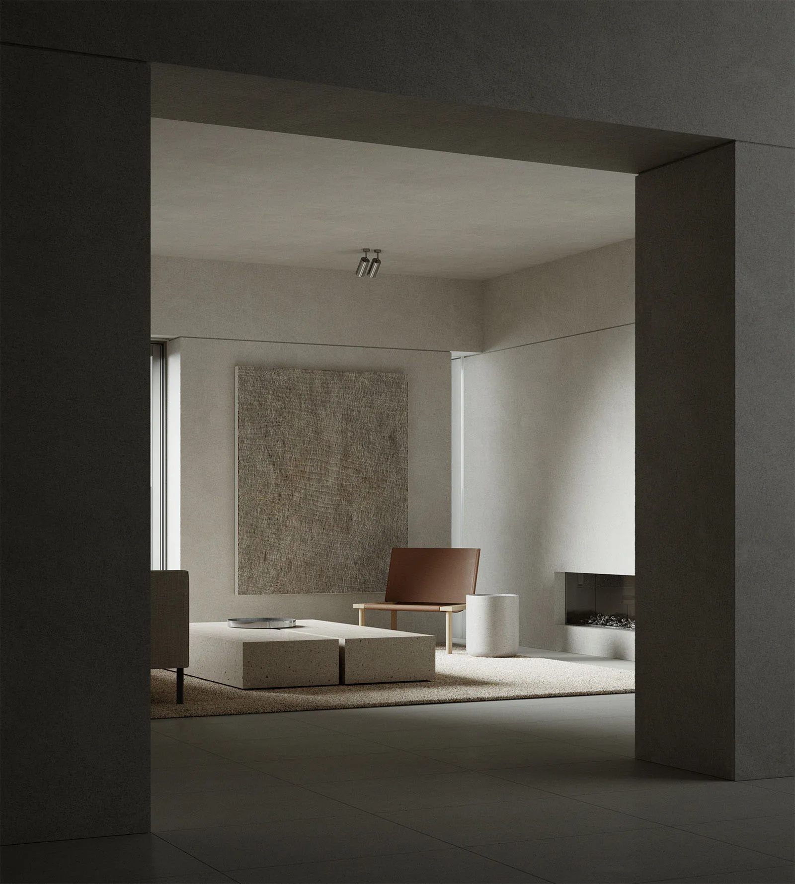 Modern minimalist living room featuring minimalist furniture and concrete surfaces