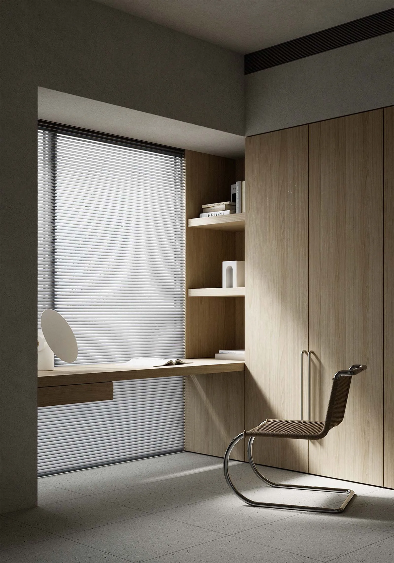 A modern home office featuring wooden cabinets and good lighting.