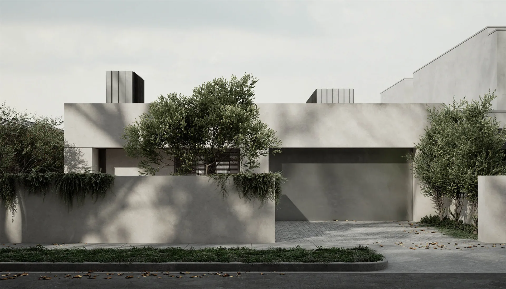 A modern residential exterior with concrete walls and a minimalist design.