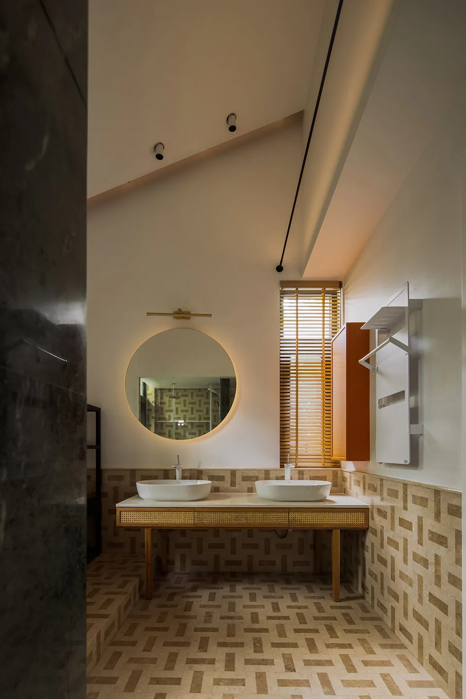 Modern bathroom featuring ceramic tiles with a geometric pattern