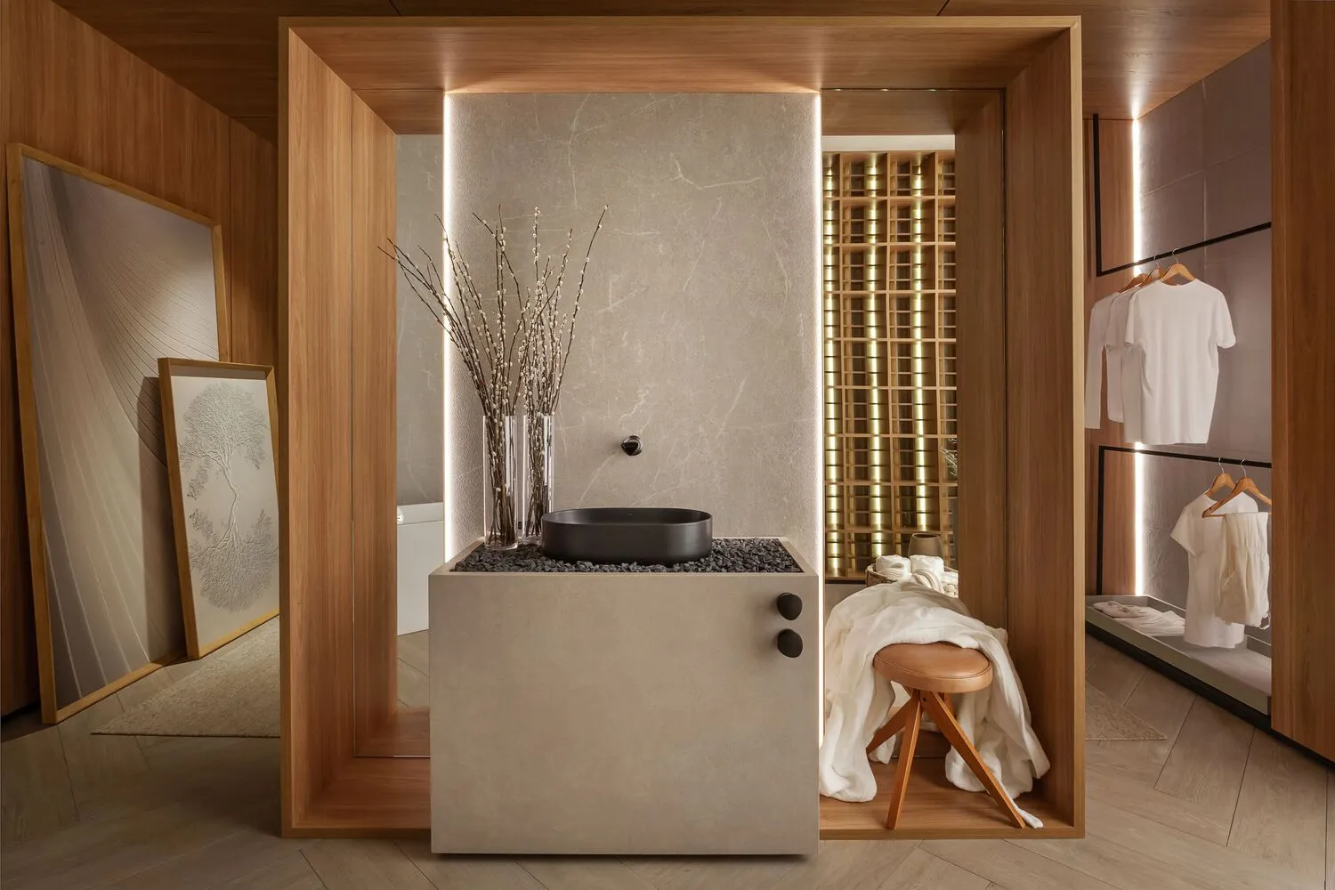A modern bathroom with a concrete vanity and marble accents.