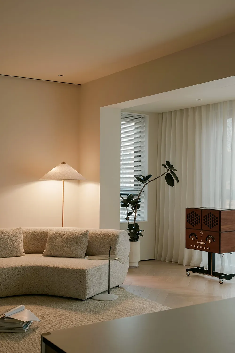 Modern living room with neutral-toned furniture and decor.
