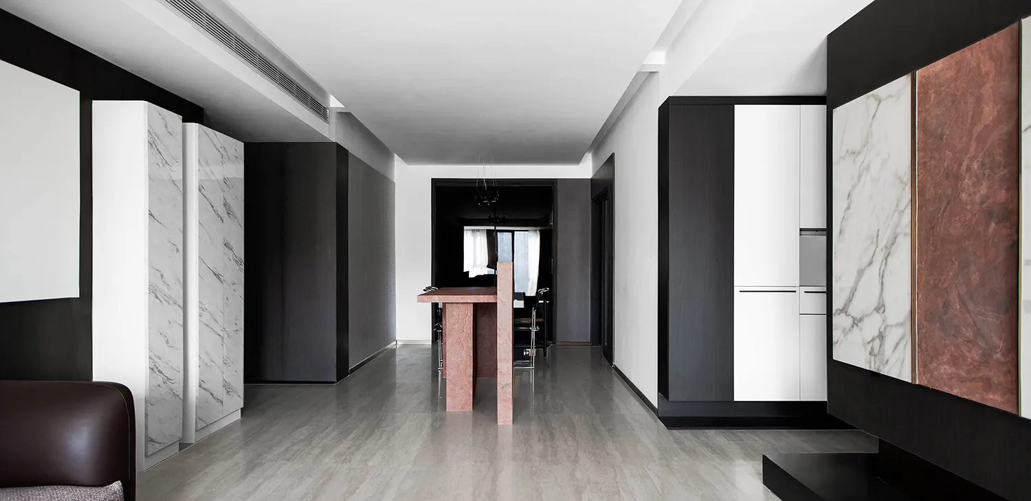 Modern residential interior design featuring marble flooring and minimalist style