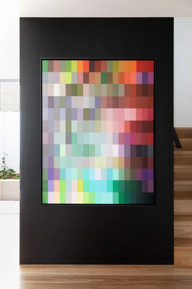 A pixelated color sample board featuring various shades of colors arranged in a grid.