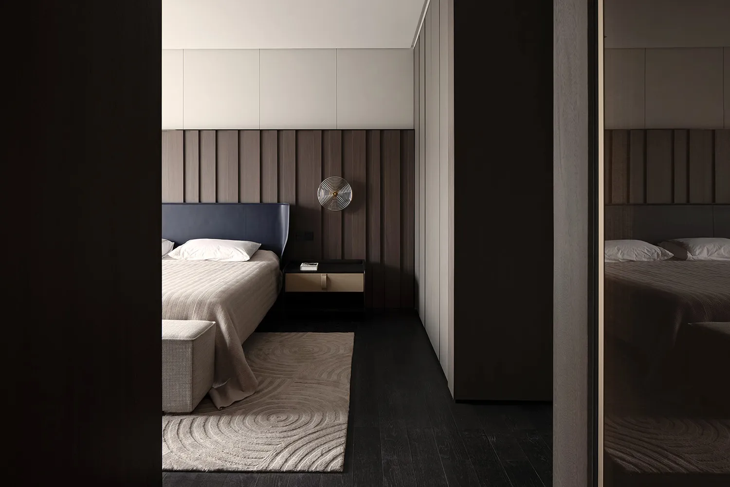 Contemporary bedroom featuring minimalist furniture and wooden paneling for a stylish and comfortable living space.