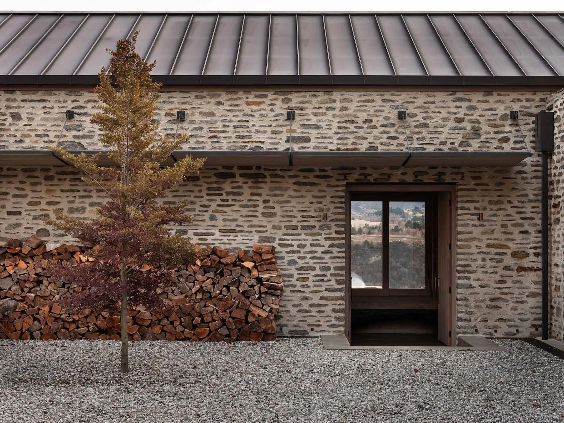 A stone building with an industrial exterior.