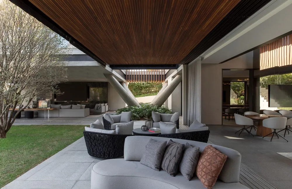 Modern minimalist living room with concrete and steel elements