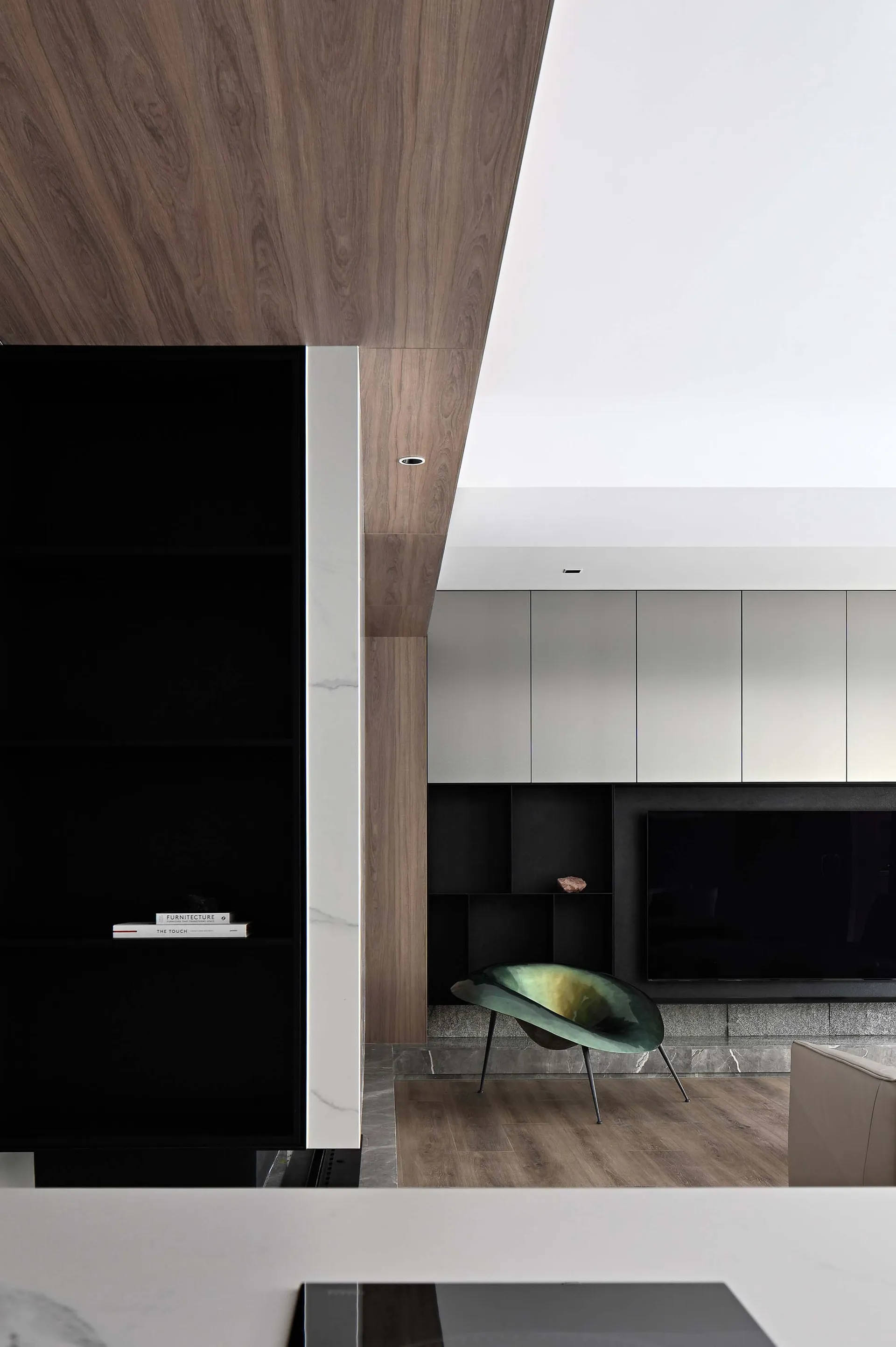Modern interior design featuring marble elements in a living room setting.