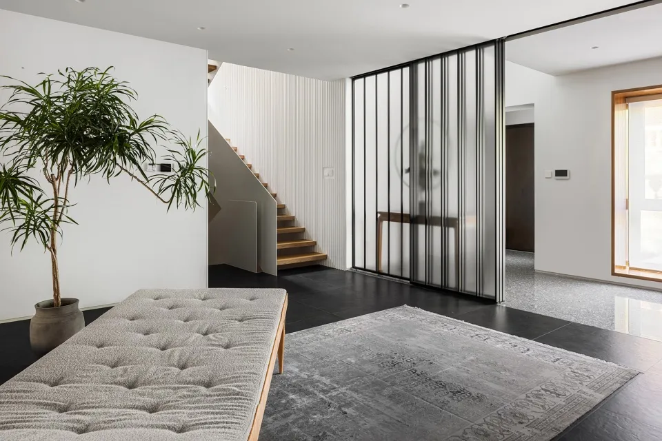 Modern, minimalist interior design featuring sleek, metal accents.