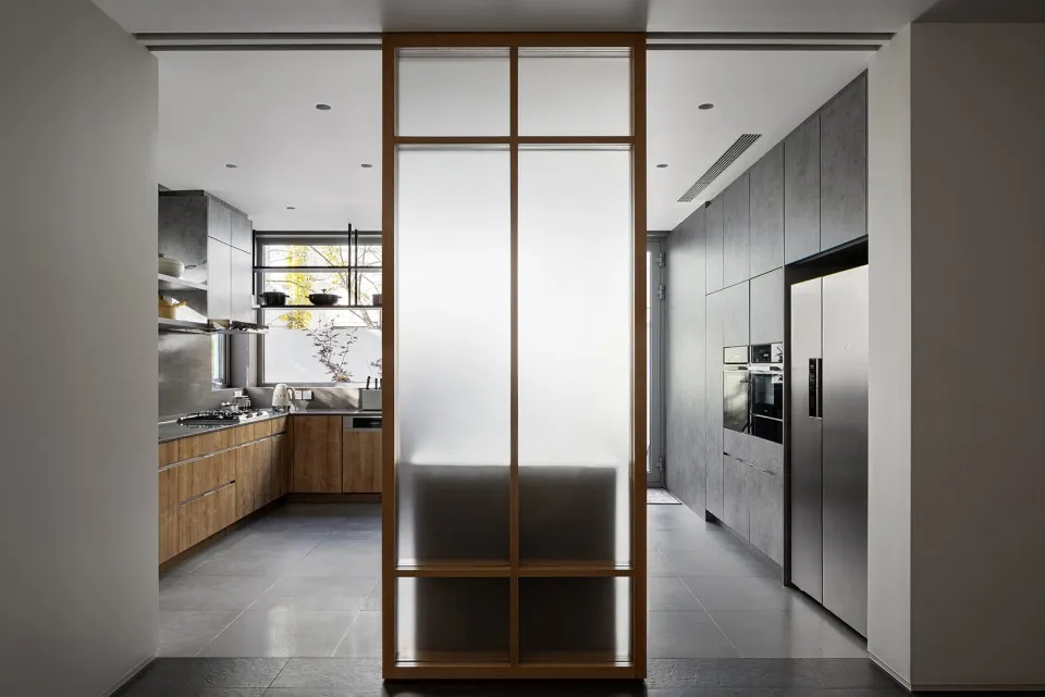 Contemporary kitchen interior with modern materials and design.